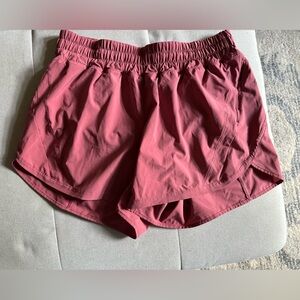 Lululemon “track that high rise lined short”